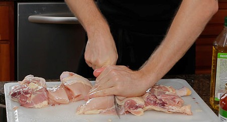 cutting chicken