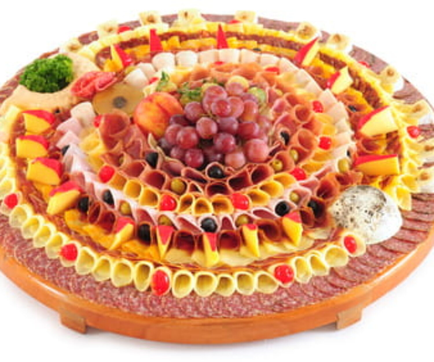 Cheese, meat, and fruit display.